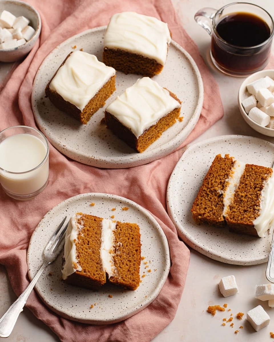 The image shows several slices of orange-brown cake with a smooth, white frosting layer on top, placed on white speckled plates. The largest plate holds six slices arranged with some crumbs scattered around, while two smaller plates each hold two slices, one of which is partially eaten with a piece broken off near a silver fork. In the background, there is a clear glass cup filled with dark coffee, a small white bowl filled with sugar cubes, and a glass of milk. All items are set on a soft pink cloth with a white marbled texture surface visible around the edges. photo taken with an iphone --ar 4:5 --v 7
