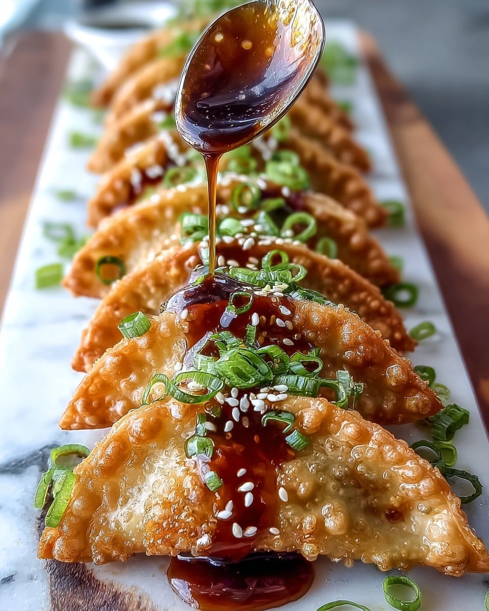 A row of golden brown fried dumplings with a bubbly, crisp texture are lined up neatly on a white marbled surface, each topped with fresh chopped green onions and sprinkled with white sesame seeds. A thick, glossy dark sauce is being drizzled over them from a spoon held by a woman's hand, giving the dumplings a shiny glazed look and adding a rich contrast to the light crispy exterior. The dumplings are arranged closely in a slightly slanted line, showing off their triangular shape and layers of crispy dough. photo taken with an iphone --ar 4:5 --v 7